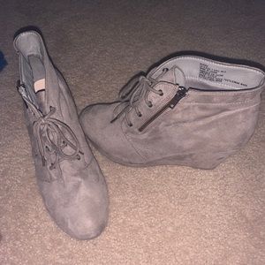 Worn a couple times beige wedged booties